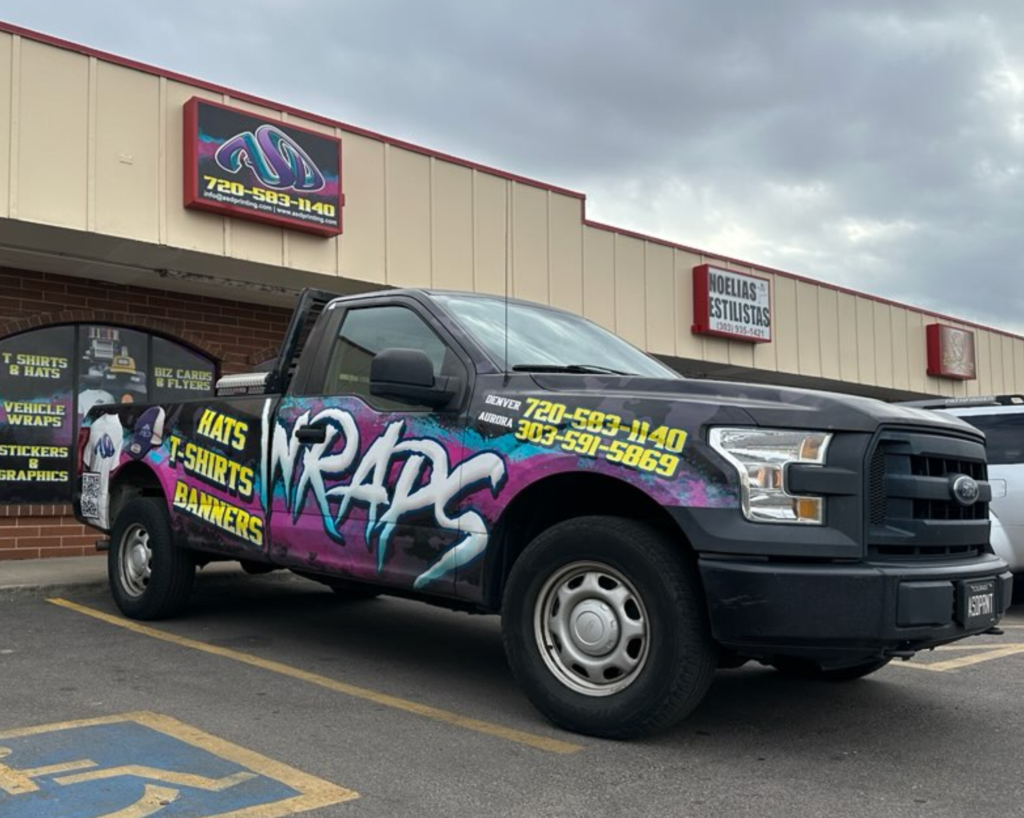 Wrapped Ford F-150 pickup outside ASD Printing in Denver.